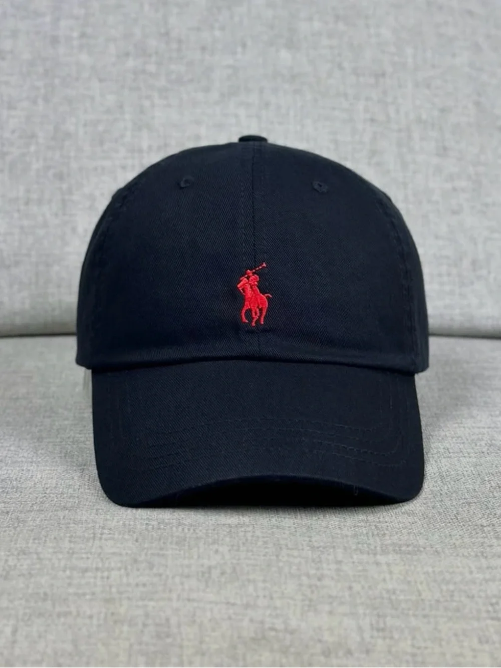 Polo Ralph Lauren black baseball hat with red logo, adjustable fit